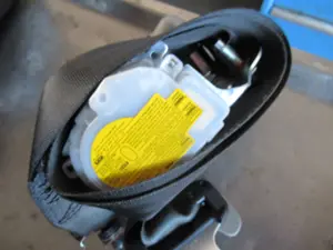 Prétensionneur avant