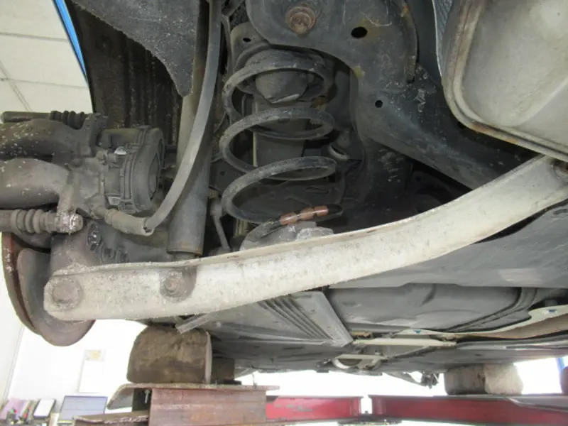 Bras de suspension arrière gauche