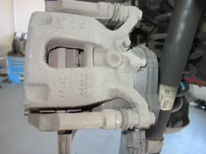 Bremszange hinten links